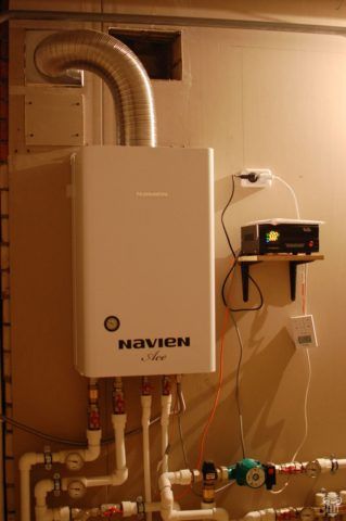 Двухконтурный котел подключен к системам ГВС и отопления
